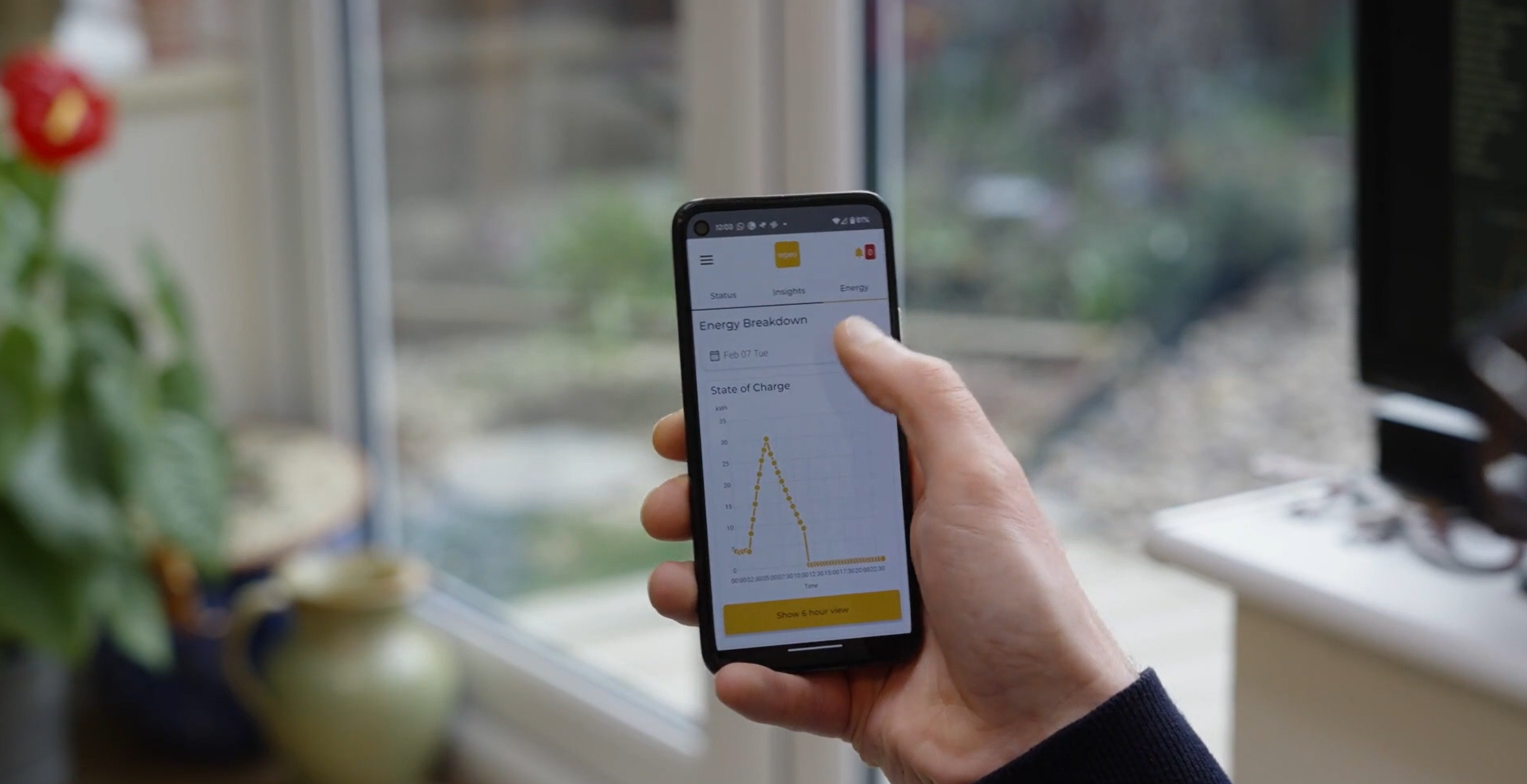 person using the tepeo app to see their zeb data
