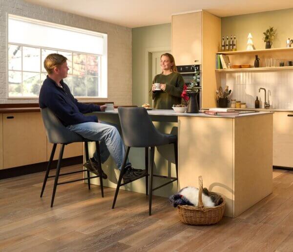 couple in modern kitchen heated by tepeo heat battery boiler